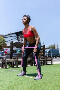 "A person starting their fitness journey using Gategold gym equipment – strength and cardio training machines."